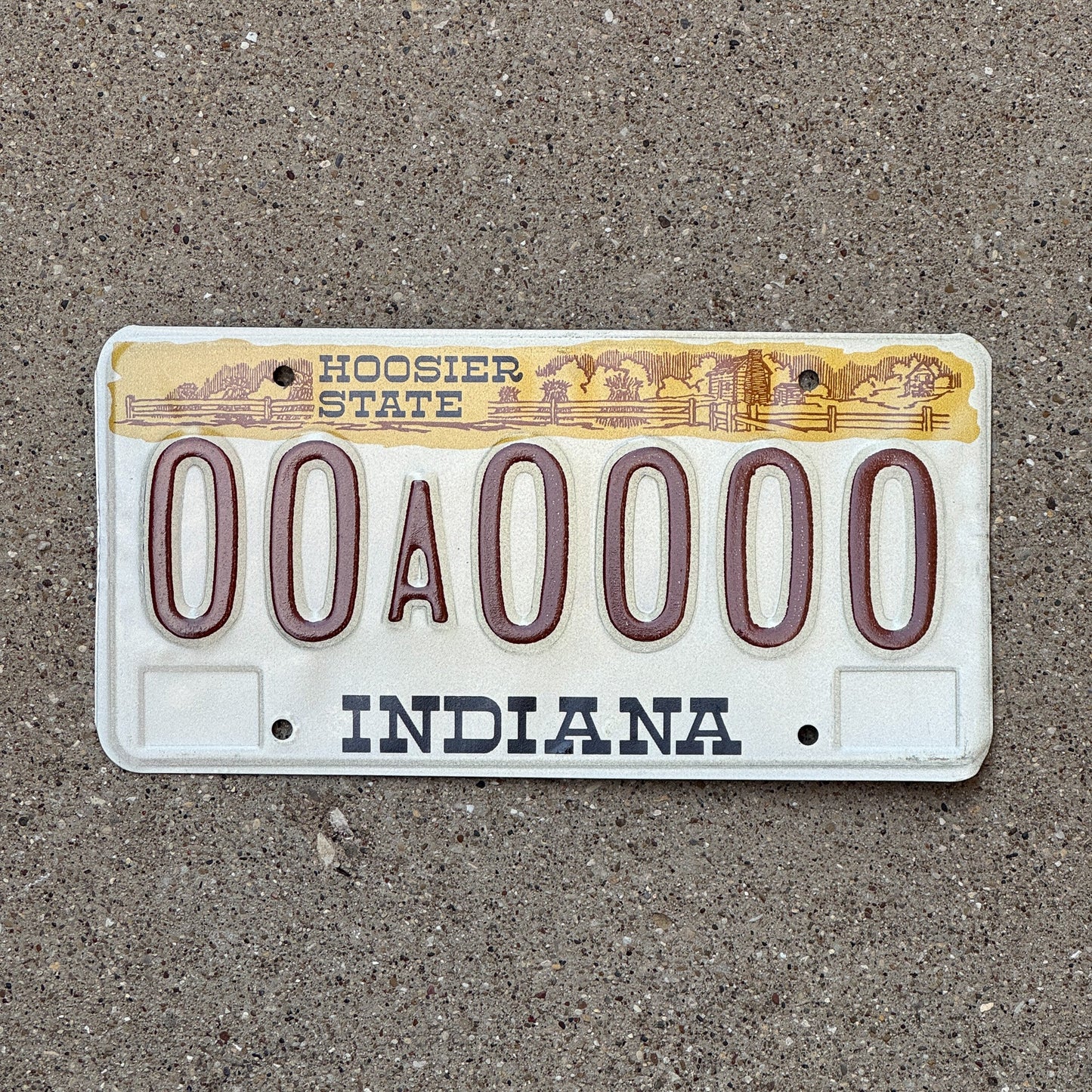 Photo of a 1982 Indiana Sample License Plate Auto Tag 4 Vintage 00A0000 with original patina