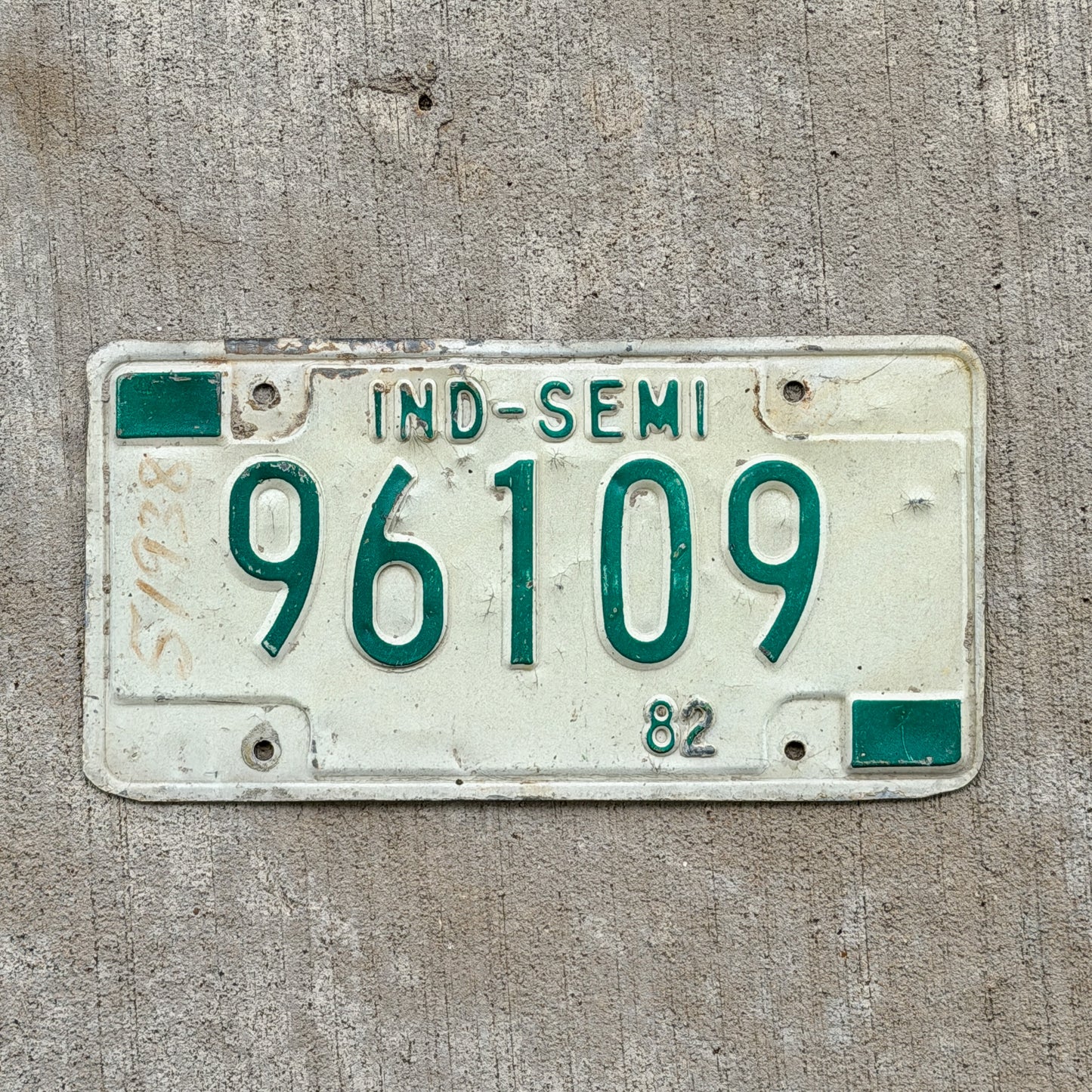 Photo of a 1982 Indiana Semi Trailer License Plate Auto Tag Garage Decor Vintage 96109 with original patina