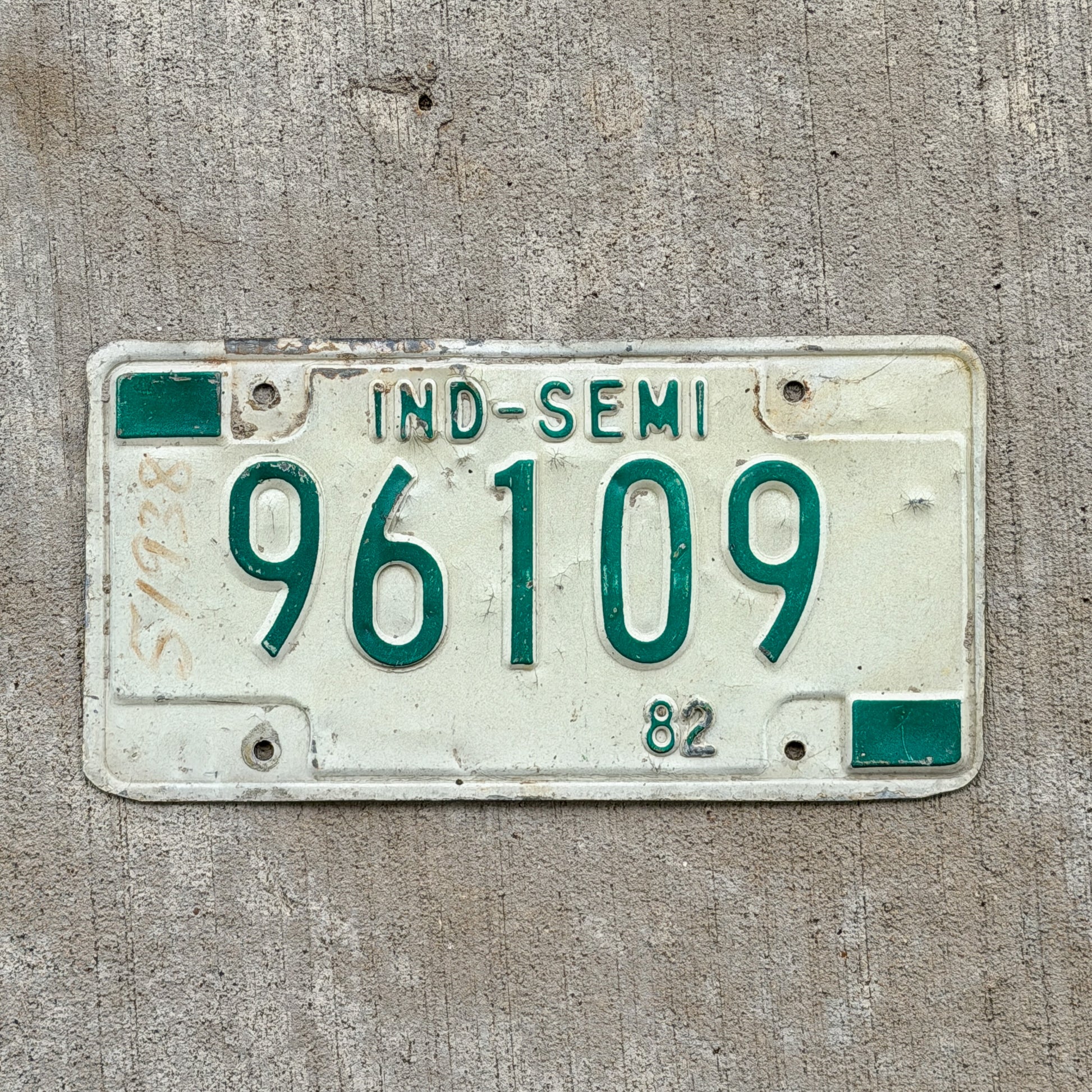 Photo of a 1982 Indiana Semi Trailer License Plate Auto Tag Garage Decor Vintage 96109 with original patina