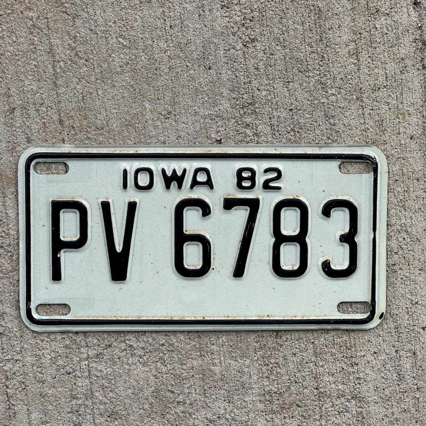 Photo of a 1982 Iowa Motorcycle License Plate Auto Tag Garage Decor Vintage PV 66783