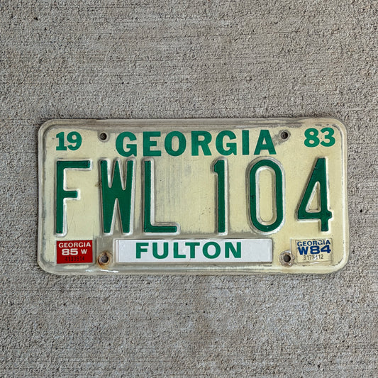 Photo of a 1983 1985 Georgia License Plate Auto Tag Garage Decor Vintage FWL 104 with original patina