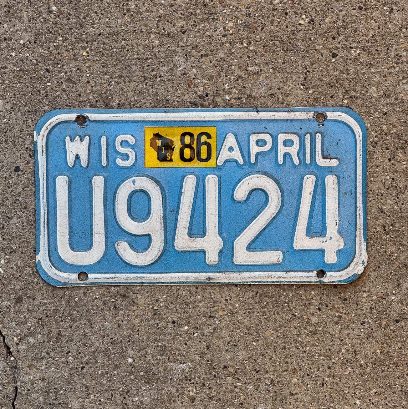 Photo of a 1983 1986 Wisconsin Motorcycle License Plate Auto Tag Garage Decor U 9424