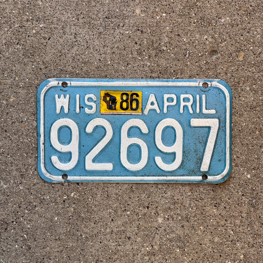 Photo of a 1983 1986 Wisconsin Motorcycle License Plate Auto Tag Garage Decor Vintage 92697 with original patina