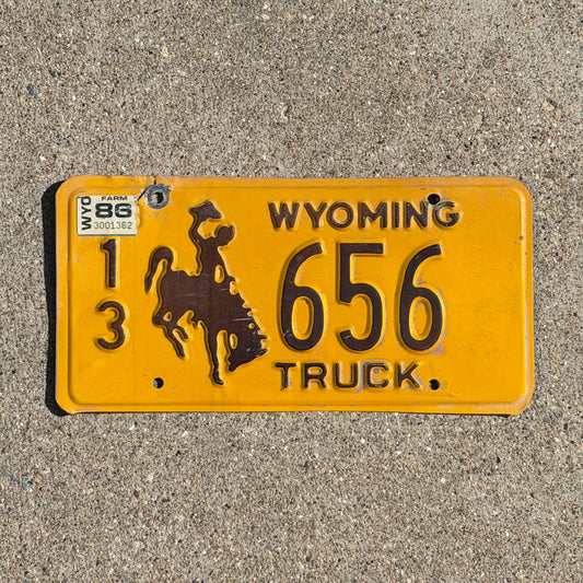 Photo of a 1983 1986 Wyoming Truck License Plate Auto Tag 2 Vintage Cowboy Rodeo 13 656 with original patina