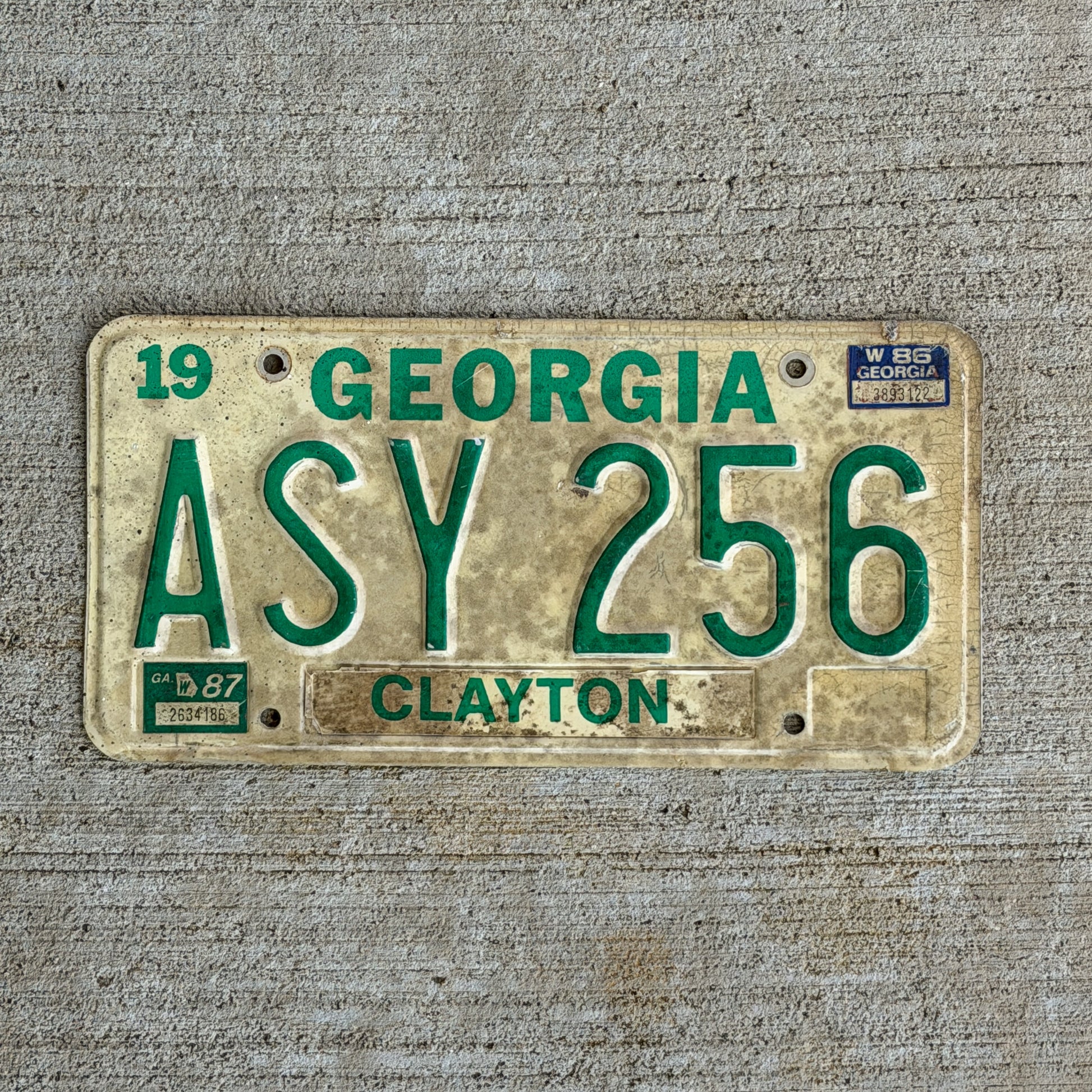 Photo of a 1983 1987 Georgia License Plate Auto Tag Garage Decor Vintage ASY 256 with original patina