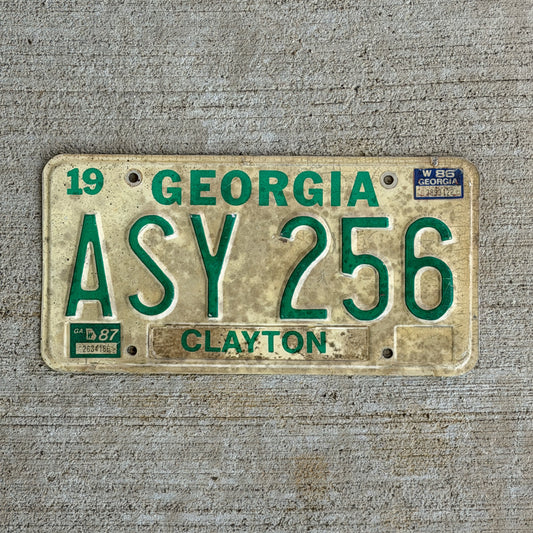 Photo of a 1983 1987 Georgia License Plate Auto Tag Garage Decor Vintage ASY 256 with original patina