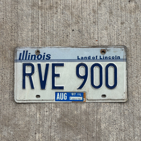 Photo of a 1983 1987 Illinois License Plate Auto Tag Garage Decor Vintage RVE 900 with original patina