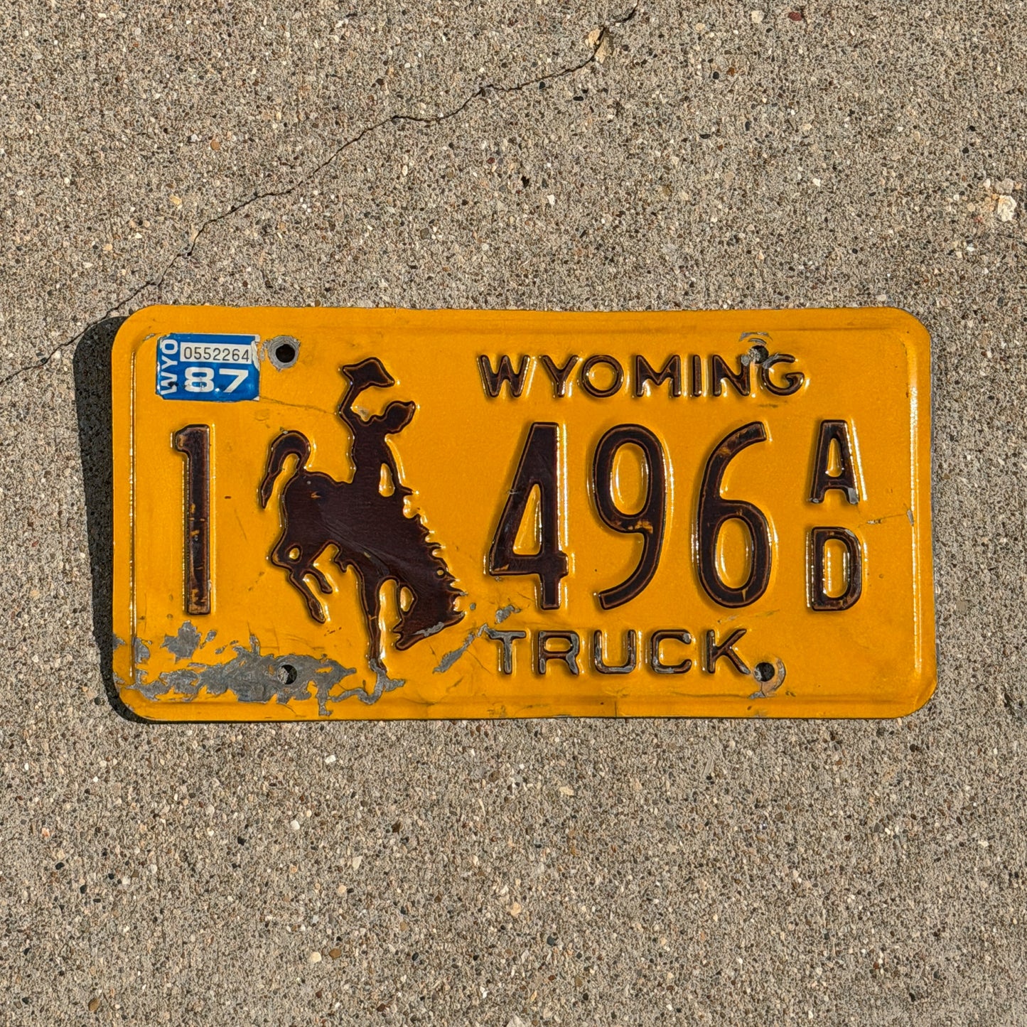 Photo of a 1983 1987 Wyoming Truck License Plate Auto Tag Garage Decor Vintage Cowboy Rodeo 1 496 AD with original patina