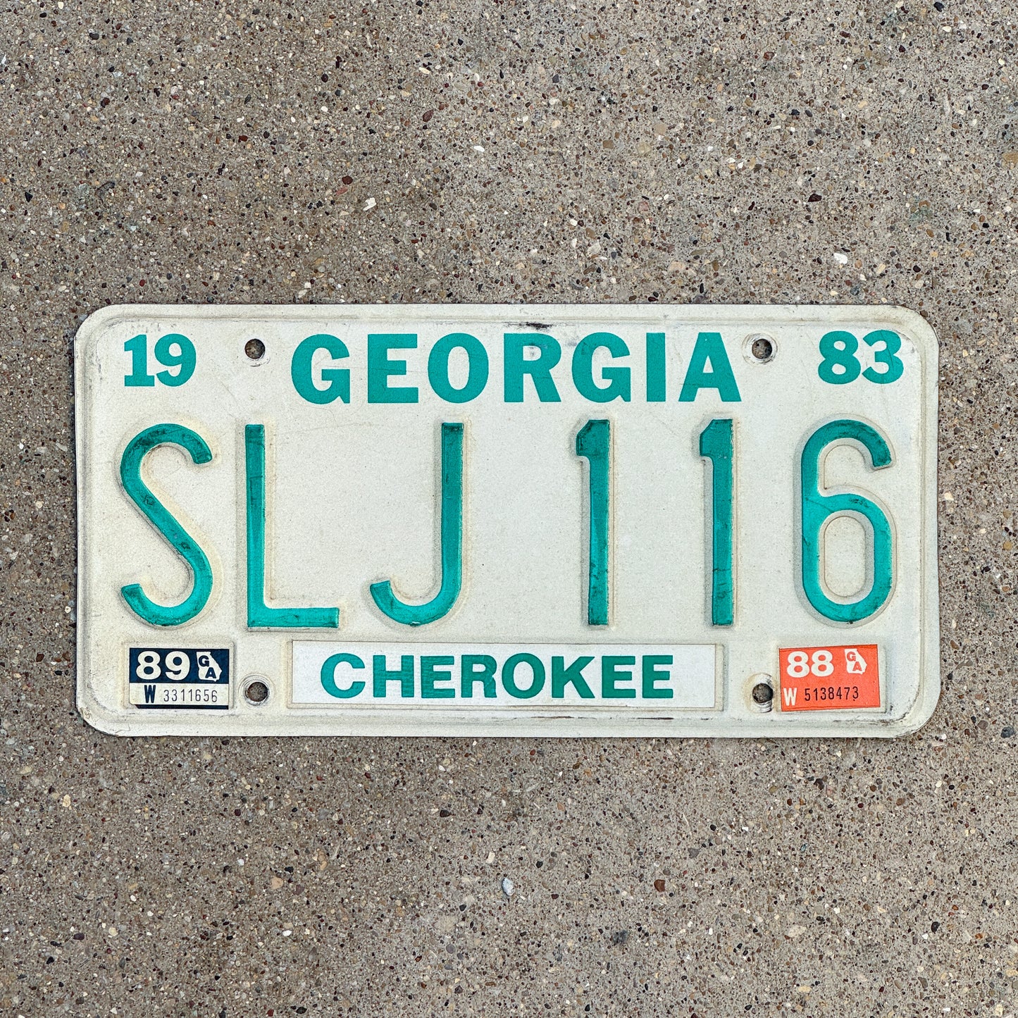 Photo of a 1983 1989 Georgia License Plate Auto Tag Garage Decor Vintage SLJ 116 with original patina