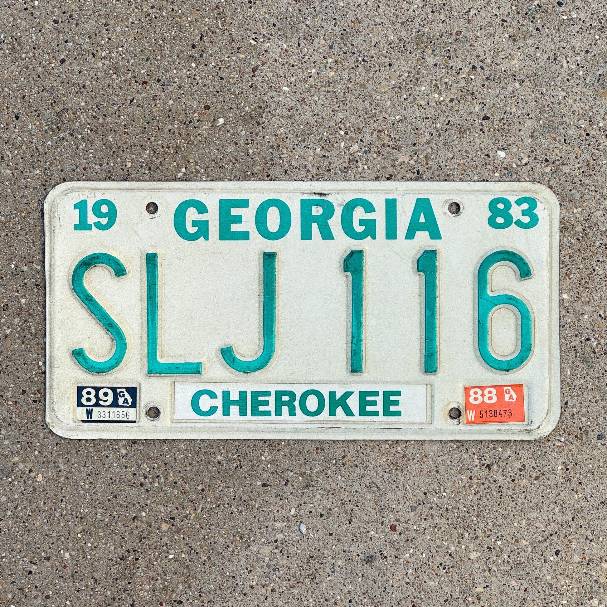 Photo of a 1983 1989 Georgia License Plate Auto Tag Garage Decor Vintage SLJ 116 with original patina