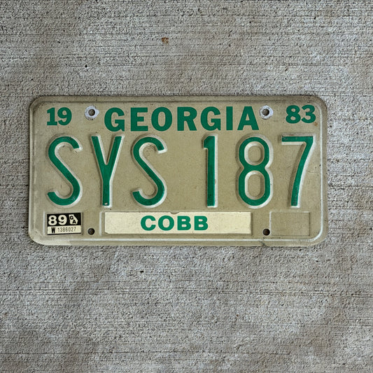 Photo of a 1983 1989 Georgia License Plate Auto Tag Garage Decor Vintage SYS 187 with original patina