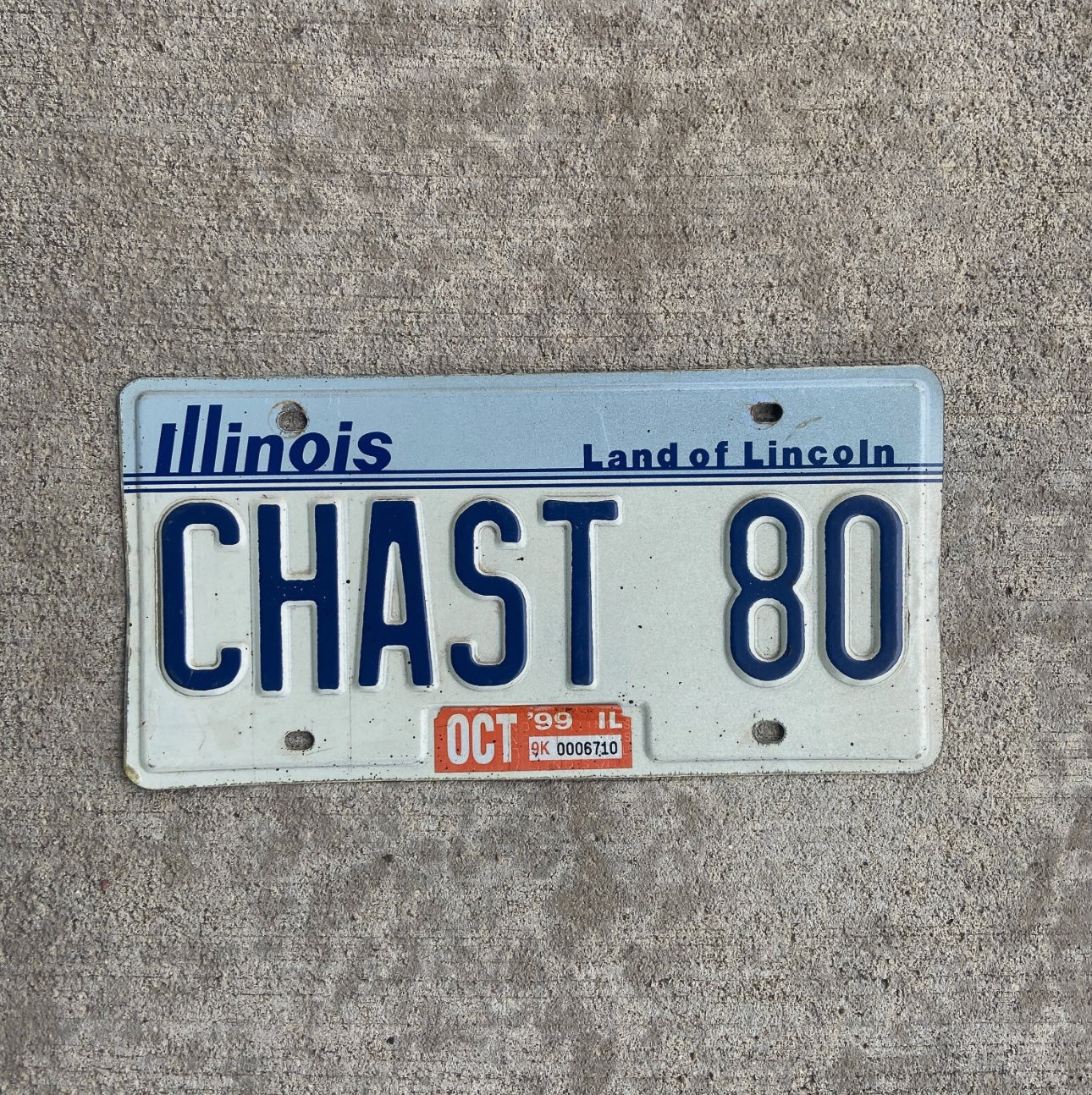 Photo of a 1983 1999 Illinois Vanity License Plate Auto Tag Garage Decor Vintage Chaste Abstinence Religious CHAST 80 with original patina