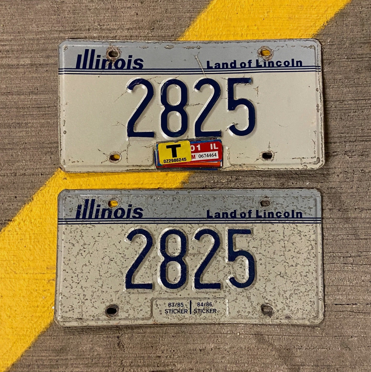 Photo of a 1983 2001 Illinois License Plate Pair Auto Tag Garage Decor Vintage Low Number Four Digit 2825 with original patina