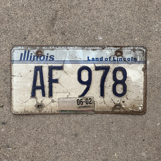 Photo of a 1983 2002 Illinois License Plate Auto Tag Garage Decor Vintage AF 978 with original patina