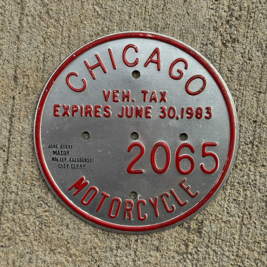 Photo of a 1983 2065 Chicago MOTORCYCLE Tax Tag Disc Disk Medallion Auto Tag Garage Decor Vintage 2065