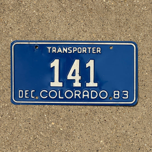 Photo of a 1983 Colorado Transporter License Plate Auto Tag Garage Decor Vintage 141