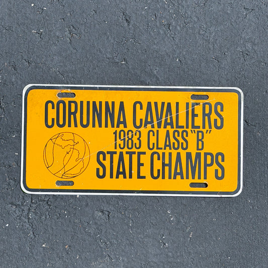 Photo of a 1983 Corunna Michigan Booster License Plate Auto Tag Garage Decor Vintage
 Cavaliers 1983 Class "B" State Champs High School Sports Metal with original patina