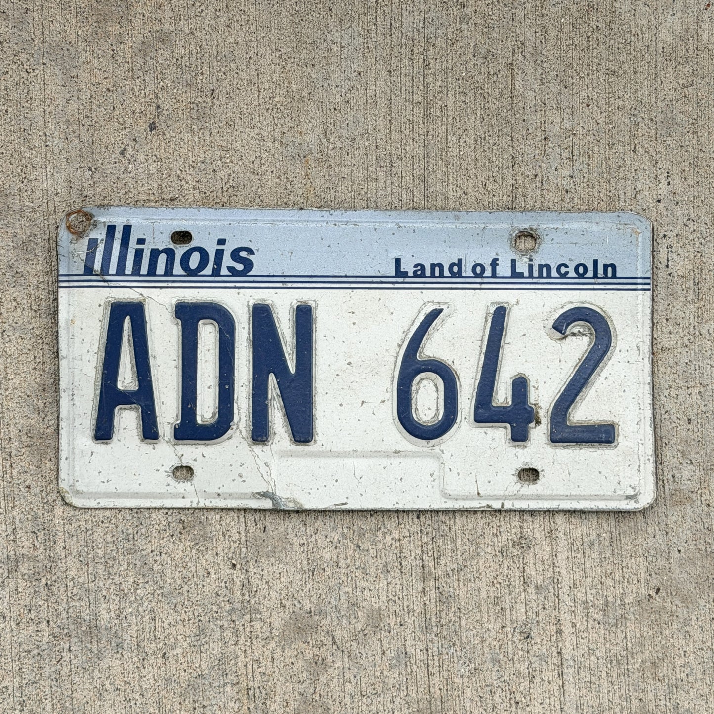 Photo of a 1983 Illinois License Plate Auto Tag Garage Decor Vintage ADN 642 with original patina