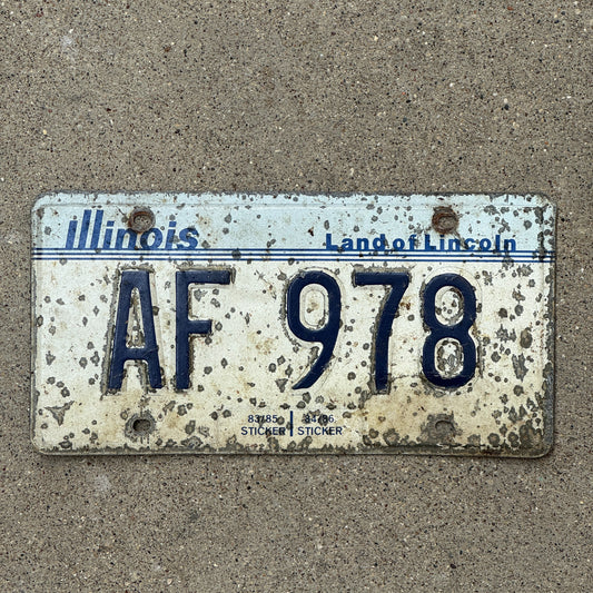 Photo of a 1983 Illinois License Plate Auto Tag Garage Decor Vintage AF 978 with original patina