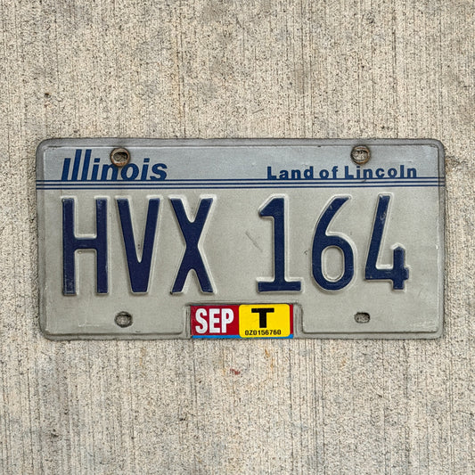 Photo of a 1983 Illinois License Plate Auto Tag Garage Decor Vintage HVX 164 with original patina