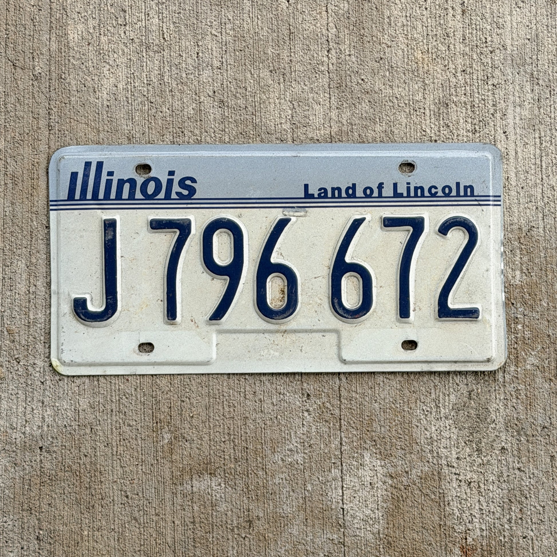 Photo of a 1983 Illinois License Plate Auto Tag Garage Decor Vintage J 796 672 with original patina