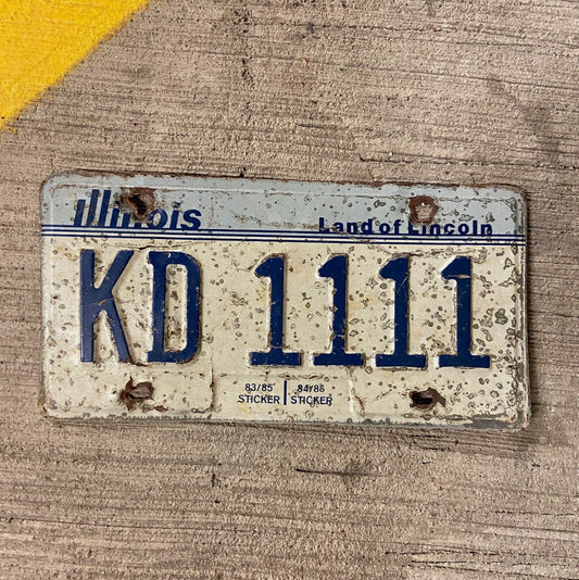 Photo of a 1983 Illinois License Plate Auto Tag Garage Decor Vintage Repeat Repeating KD 1111 with original patina