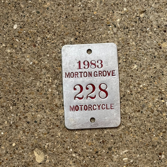 Photo of a 1983 Illinois Motorcycle Tax Tag Auto Tag Garage Decor Vintage Morton Grove 228