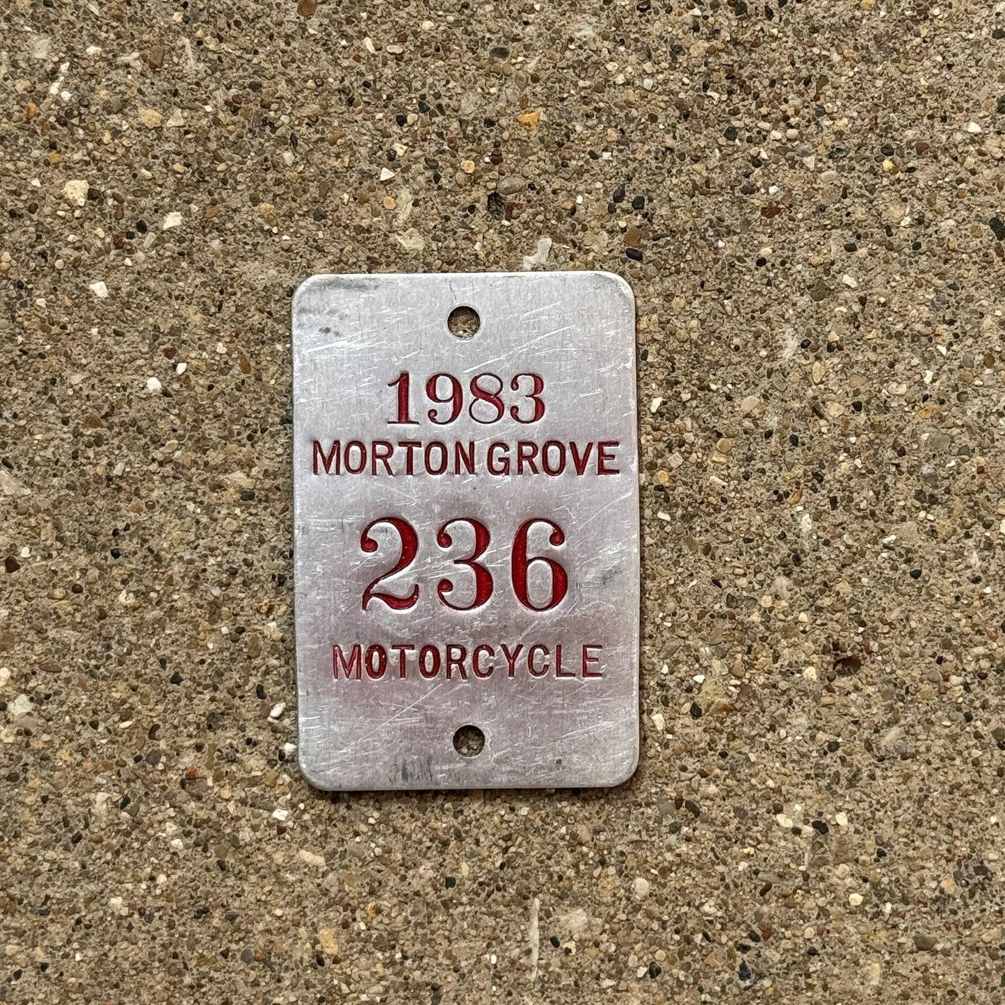 Photo of a 1983 Illinois Motorcycle Tax Tag Auto Tag Garage Decor Vintage Morton Grove 236