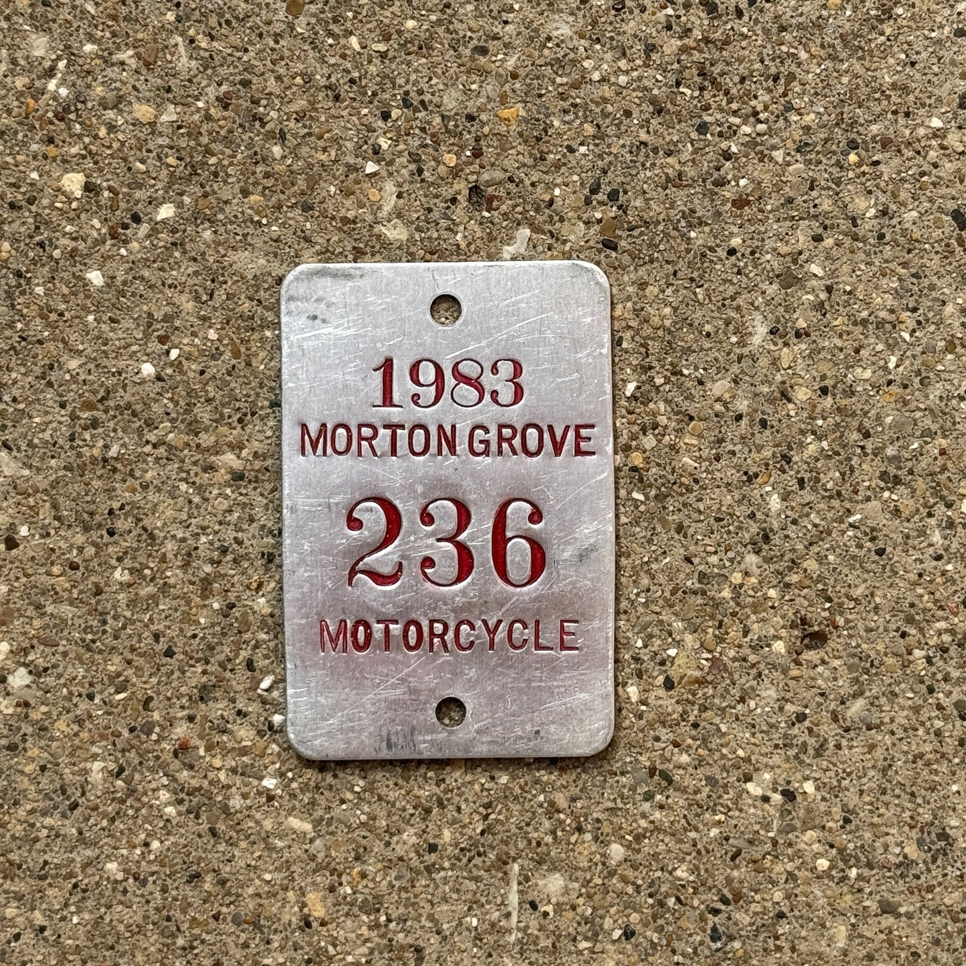 Photo of a 1983 Illinois Motorcycle Tax Tag Auto Tag Garage Decor Vintage Morton Grove 236