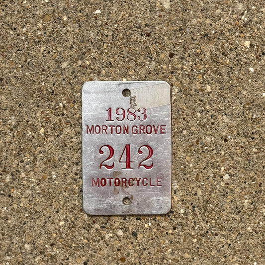 Photo of a 1983 Illinois Motorcycle Tax Tag Auto Tag Garage Decor Vintage Morton Grove 242