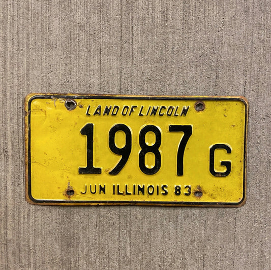 Photo of a 1983 Illinois Truck License Plate Auto Tag 2 Vintage Garage Birth Year 1987 G with original patina