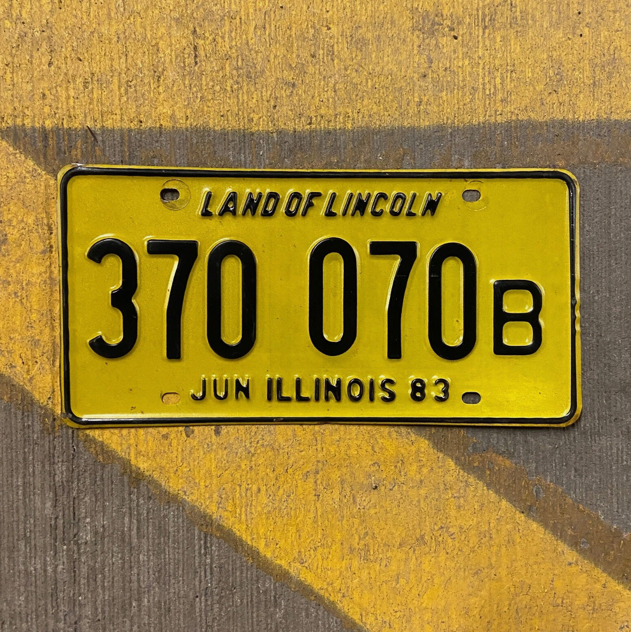 Photo of a 1983 Illinois Truck License Plate Auto Tag Garage Decor Vintage 370 070 B with original patina