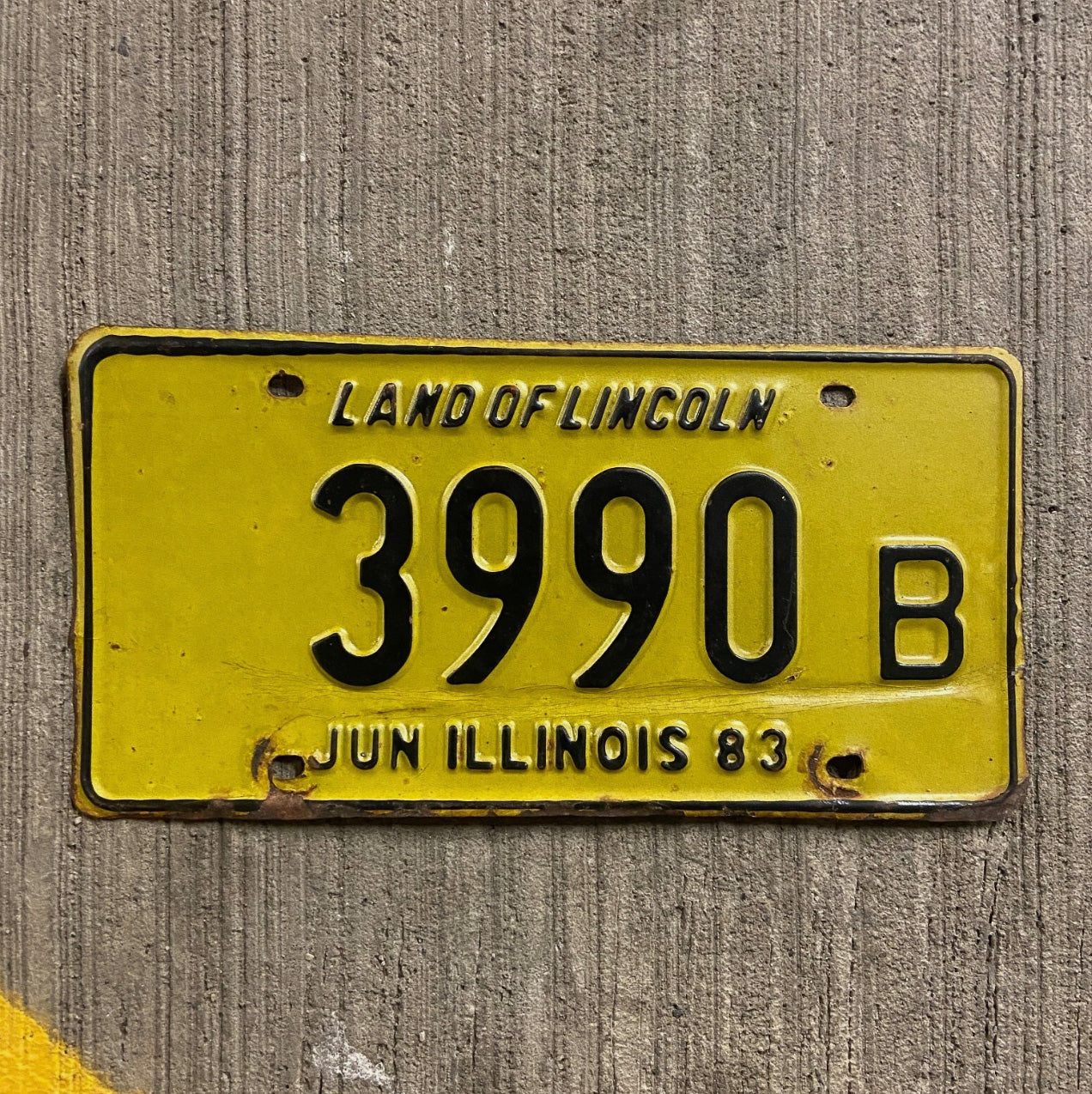 Photo of a 1983 Illinois Truck License Plate Auto Tag Garage Decor Vintage 3990 B with original patina