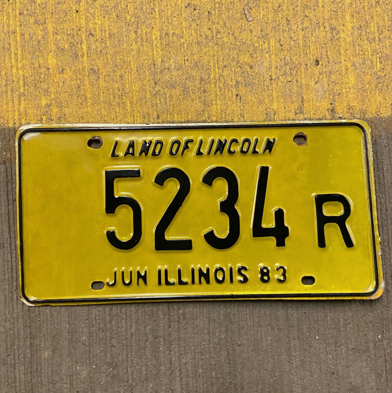 Photo of a 1983 Illinois Truck License Plate Auto Tag Garage Decor Vintage 5234 R with original patina