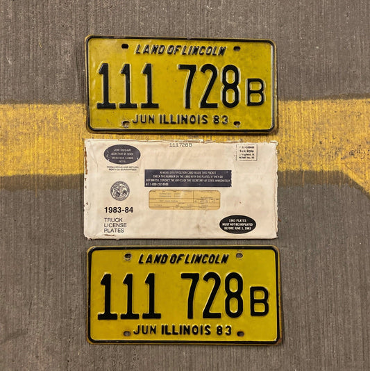 Photo of a 1983 Illinois Truck License Plate Pair Auto Tag Garage Decor Vintage Repeat Repeating 111 728 B with original patina