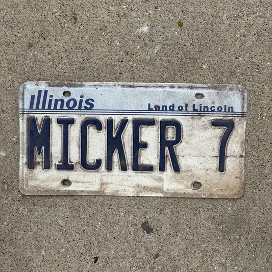 Photo of a 1983 Illinois Vanity License Plate Auto Tag Garage Decor Vintage MICKER 7 with original patina