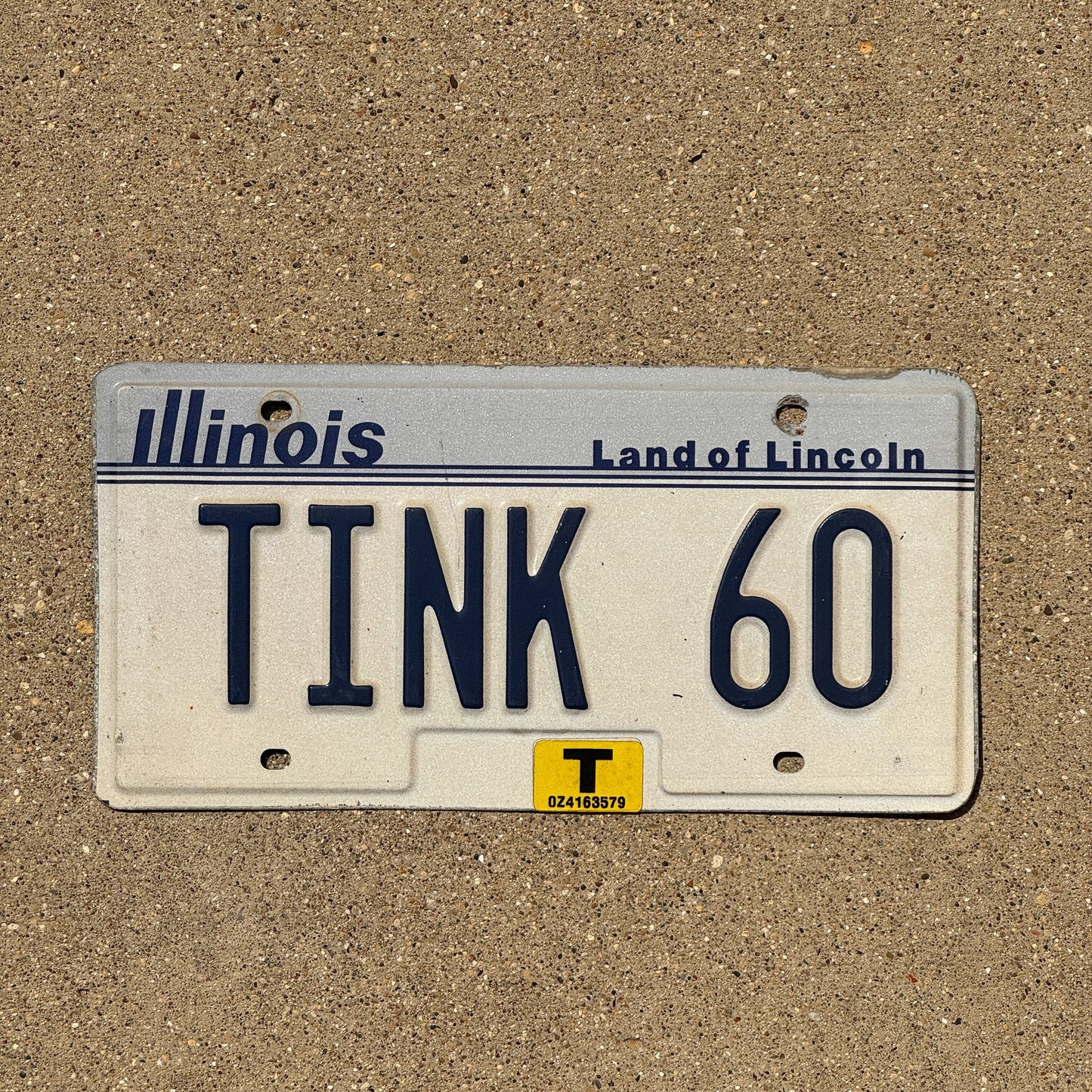 Photo of a 1983 Illinois Vanity License Plate Auto Tag Garage Decor Vintage TINK 60