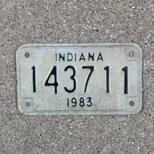 Photo of a 1983 Indiana Motorcycle License Plate Auto Tag Garage Decor Vintage 143711 with original patina