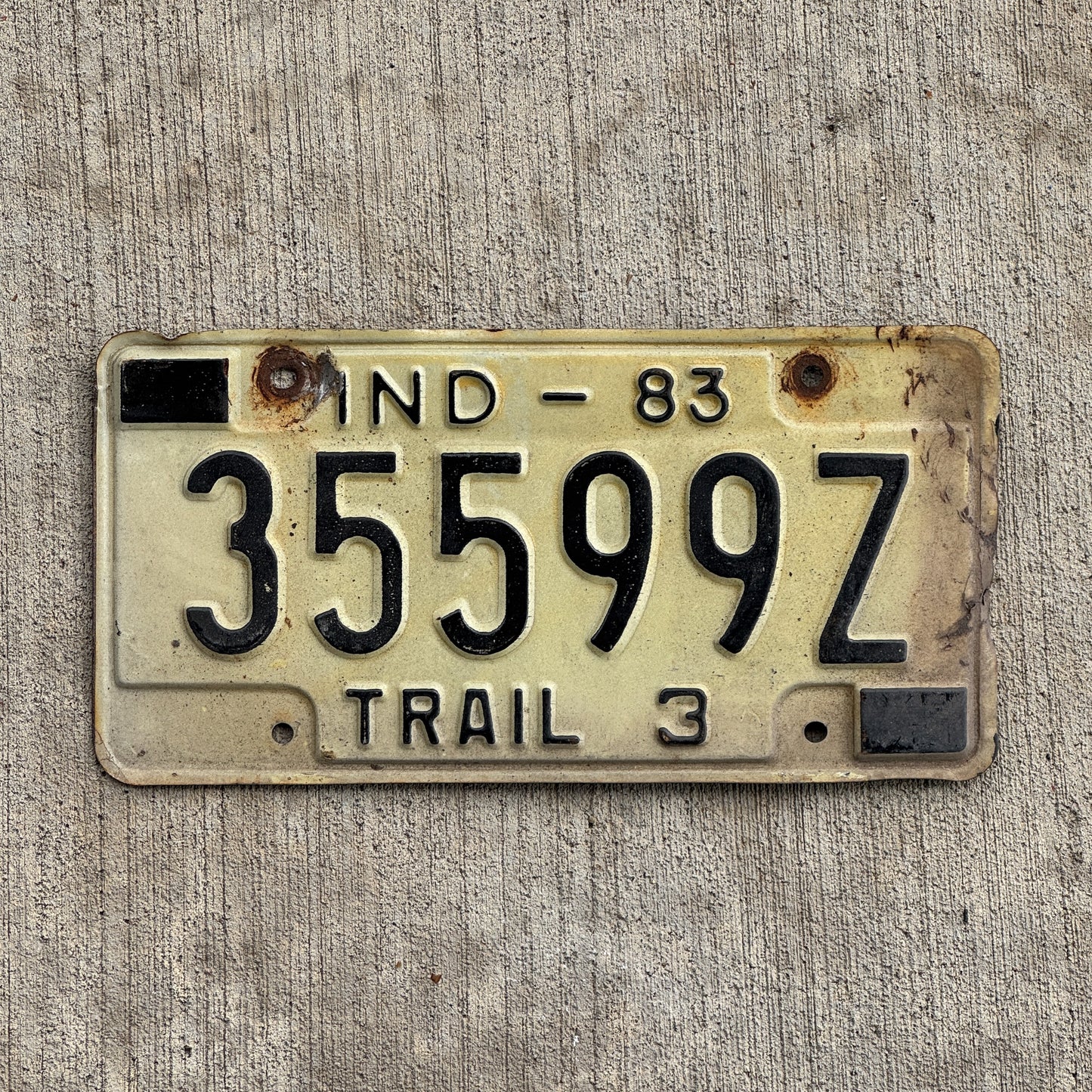 Photo of a 1983 Indiana Trailer License Plate Auto Tag Garage Decor Vintage 35599 Z with original patina
