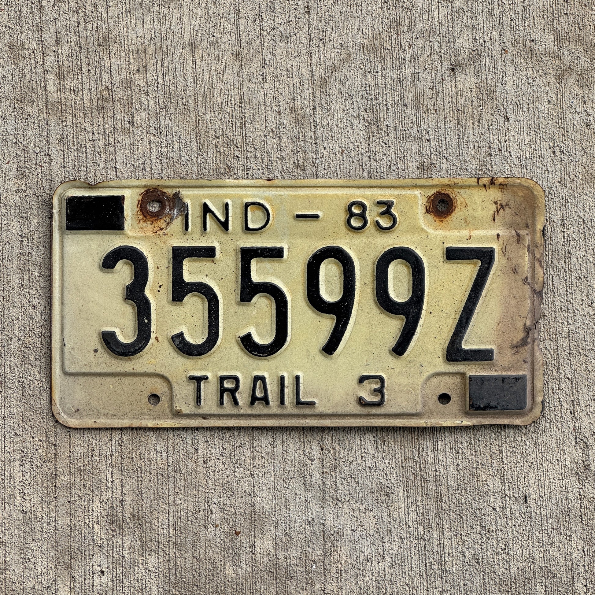 Photo of a 1983 Indiana Trailer License Plate Auto Tag Garage Decor Vintage 35599 Z with original patina
