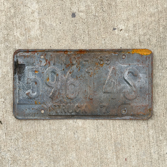 Photo of a 1983 Indiana Truck License Plate Auto Tag Garage Decor Vintage 59614 S with original patina