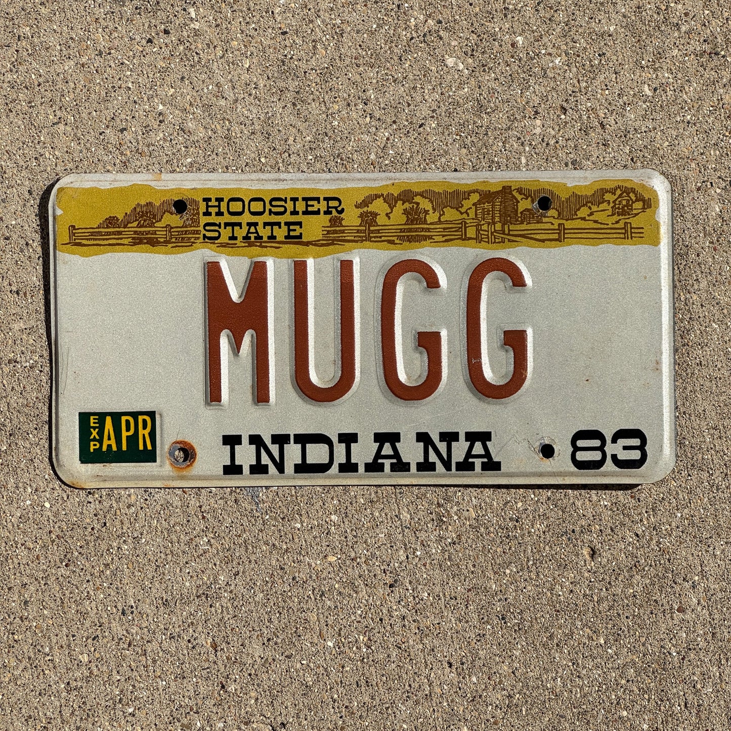 Photo of a 1983 Indiana VANITY License Plate Auto Tag Garage Decor Vintage MUGG