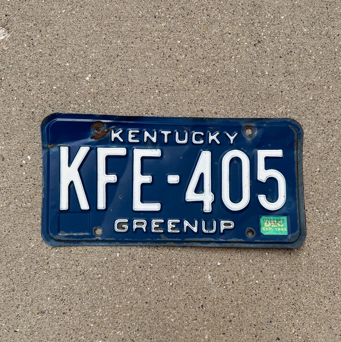 Photo of a 1983 Kentucky License Plate Auto Tag Garage Decor Vintage Natural 1983 Sticker KFE 405 with original patina