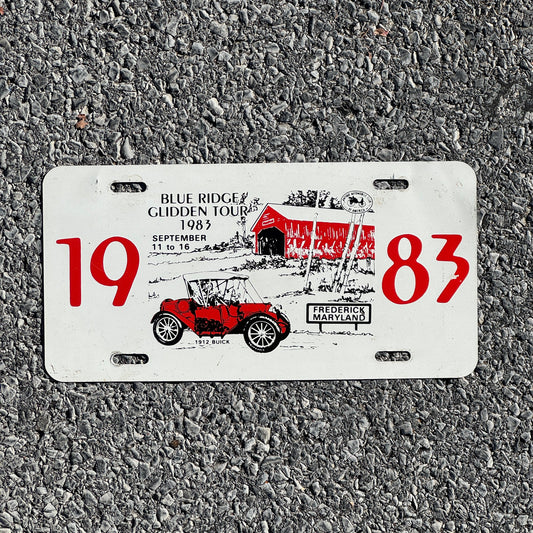 Photo of a 1983 Maryland Booster License Plate Auto Tag Garage Decor Vintage Frederick Blue Ridge Glidden Tour