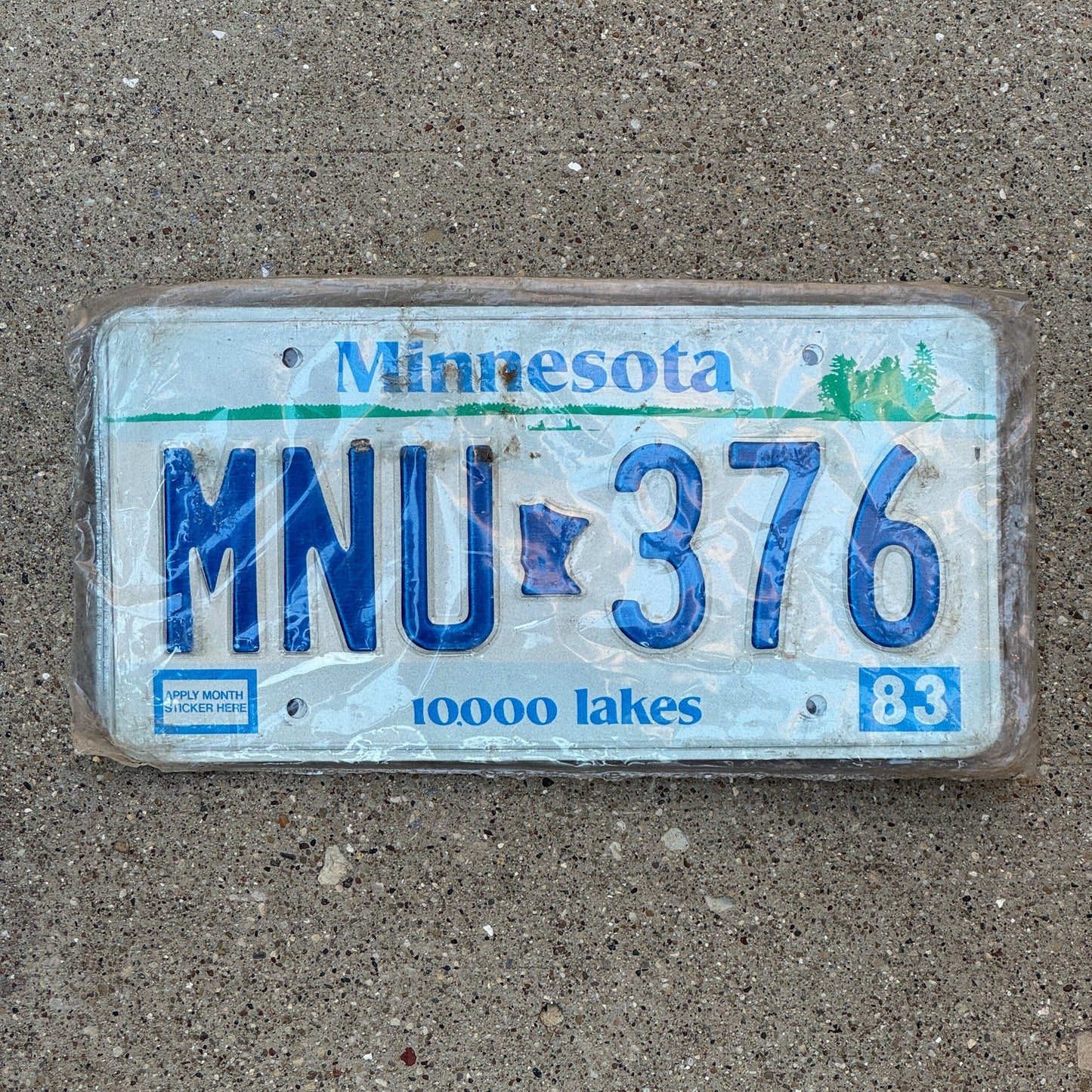 Photo of a 1983 Minnesota License Plate Pair Auto Tag Garage Decor Vintage New Old Stock, in Original Plastic MNU 376