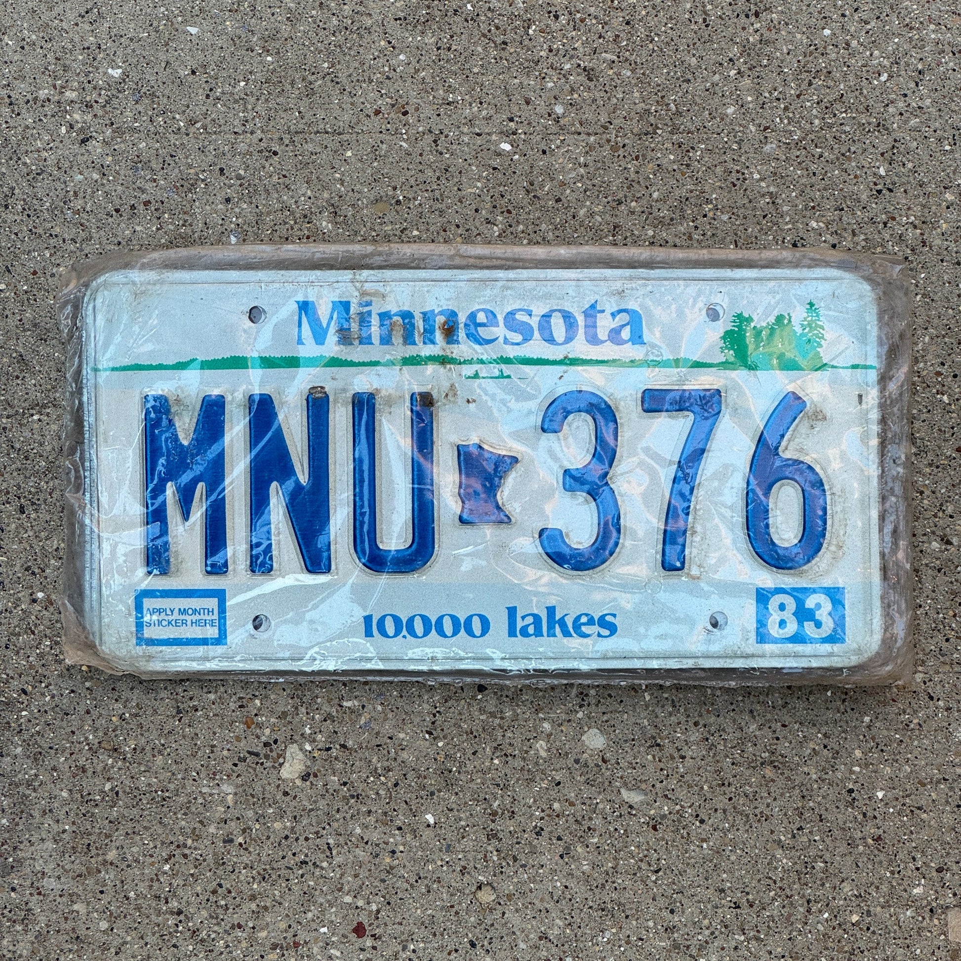 Photo of a 1983 Minnesota License Plate Pair Auto Tag Garage Decor Vintage New Old Stock, in Original Plastic MNU 376