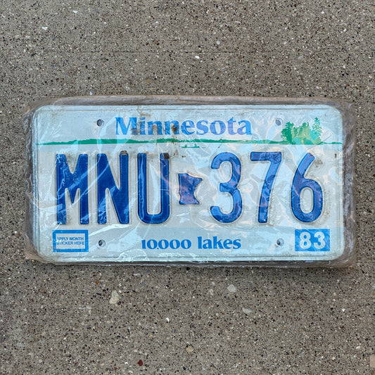 Photo of a 1983 Minnesota License Plate Pair Auto Tag Garage Decor Vintage New Old Stock, in Original Plastic MNU 376