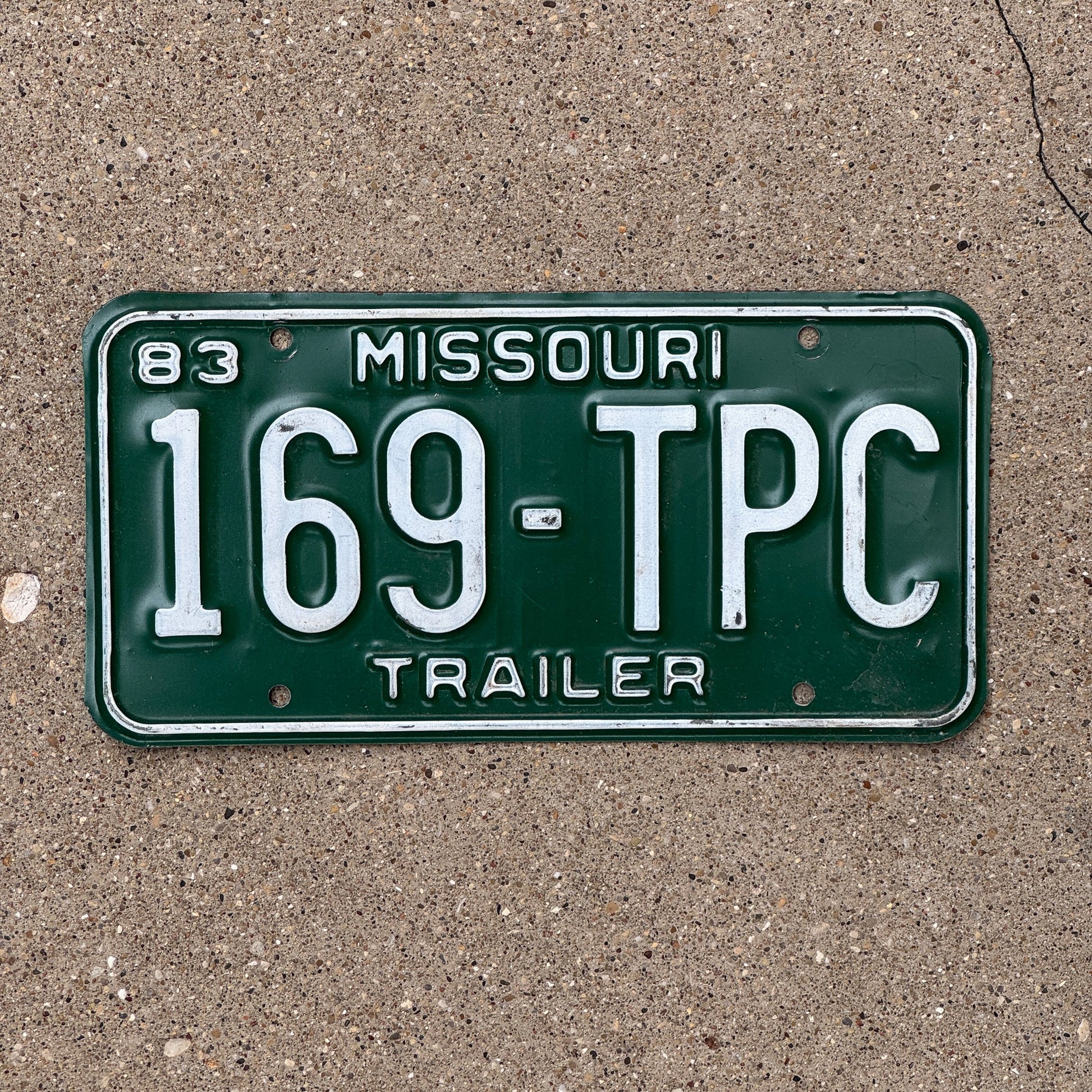 Photo of a 1983 Missouri Trailer License Plate Auto Tag Garage Decor Vintage 169 TPC