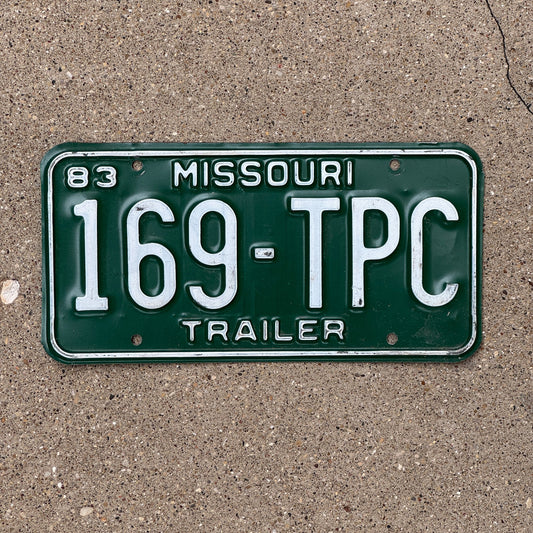 Photo of a 1983 Missouri Trailer License Plate Auto Tag Garage Decor Vintage 169 TPC