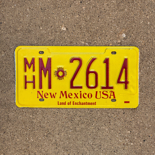 Photo of a 1983 New Mexico Mobile Home License Plate Auto Tag Garage Decor Vintage Zia MH M 2614